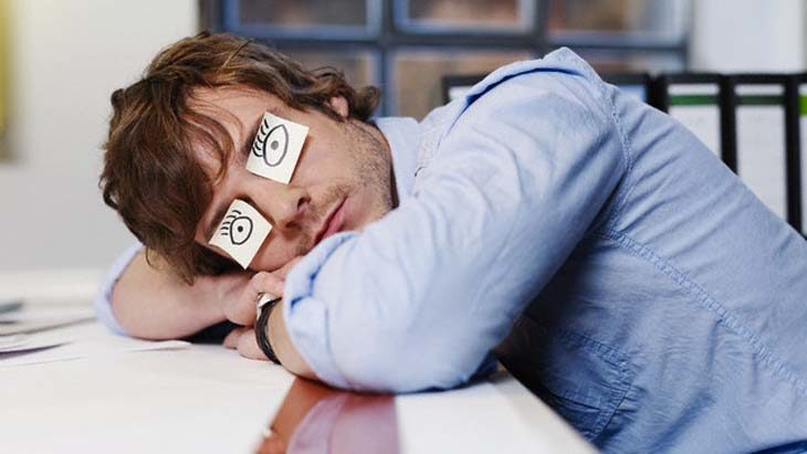 young-man-sleeping-with-drawn-on-eyes-37