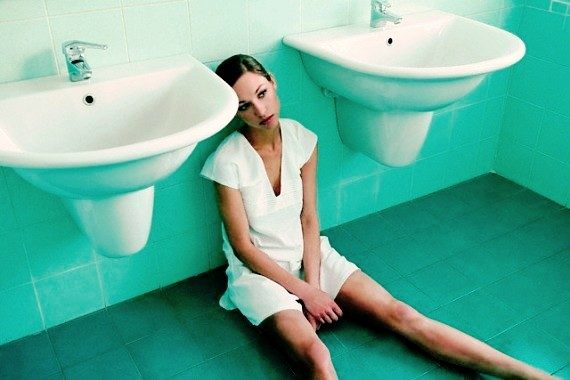 woman-sitting-on-floor-in-bathroom-image-by-gary-edwards-zefa-corbis-6