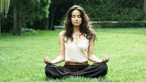 young-woman-meditating-on-lawn-17